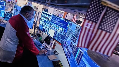File - Trader Aman Patel works on the floor of the New York Stock Exchange. 6 November 2025