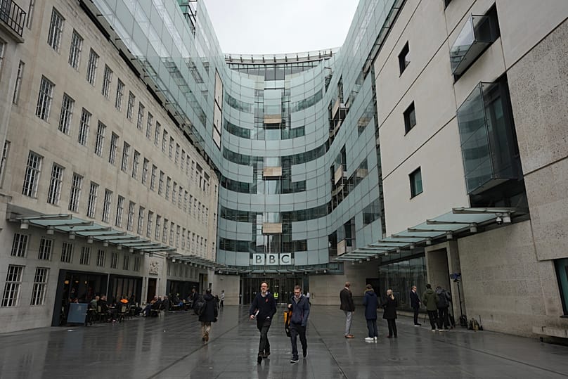 People walk outside the BBC Headquarters in London, 10 November, 2025