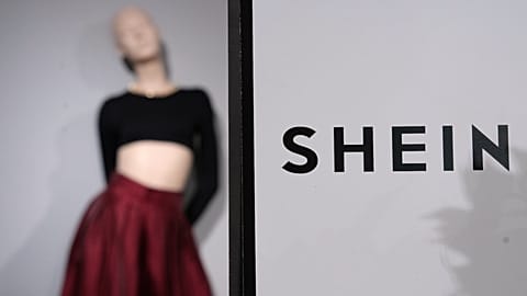 FILE: Clothes by Chinese company Shein are seen in the BHV (Bazar de l'Hotel de Ville) general store, ahead of the Shein stand opening, in Paris, 4 November 2025