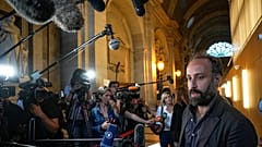 Arthur Denouveaux, survivor of the Bataclan terrorist attack, speaks to the press in 2022, after the conviction of the sole surviving terrorist