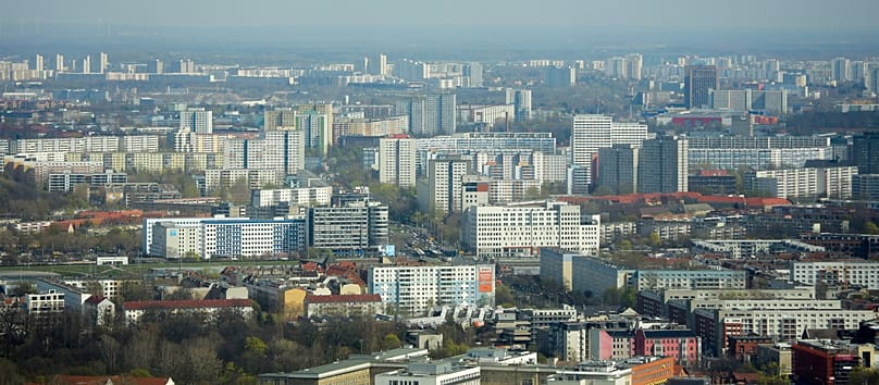 FILE - In this Thursday, April 4, 2019, file photo, Apartment buildings in the former east part of the German capital photographed from the television tower in Berlin, Germany