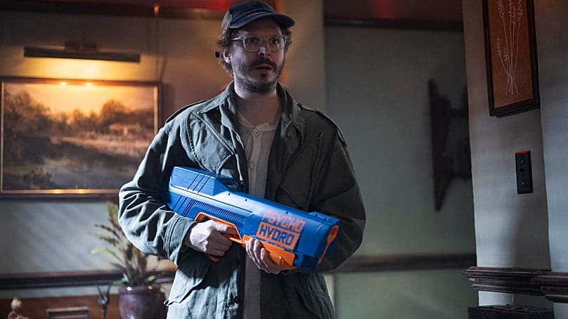Michael Cera as a revolutionary with a water gun in 'The Running Man'.