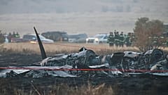 Debris is seen at a crash site of a Turkish military cargo plane in Georgia's Sighnaghi municipality, 12 November, 2025