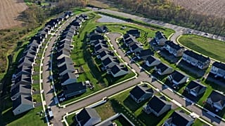 FILE - New homes dot the landscape in Middlesex Township, USA. 19 April 2023