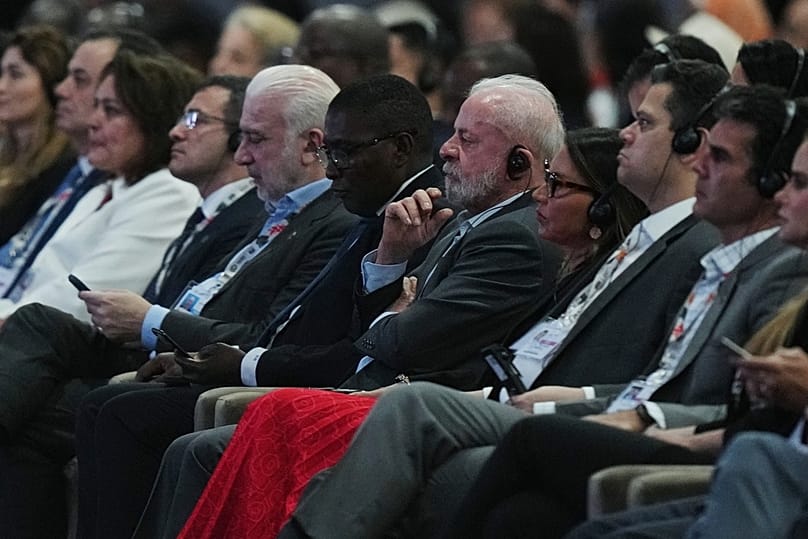 Brazil President Luiz Inacio Lula da Silva, center right, attends a plenary session at the COP30 U.N. Climate Summit 