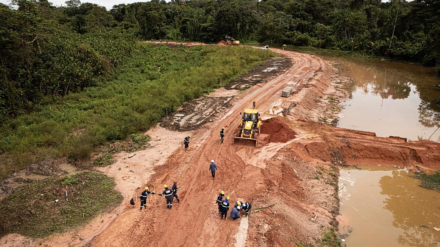 Workers construct an avenue, named Liberdade, or Freedom, ahead of the COP30 U.N. Climate Summit in Belem, Brazil, March 18, 2025.