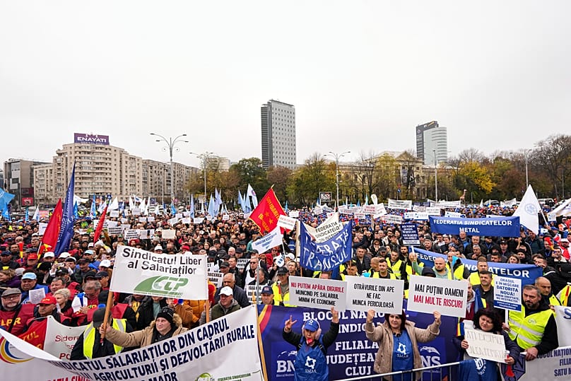 Trade union members protest against the government's austerity measures outside the government headquarters in Bucharest, 12 November, 2025