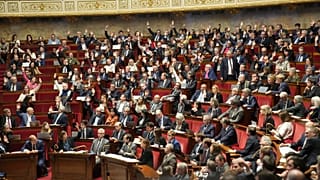 Parliament members vote at the National Assembly in Paris, 12 November, 2025