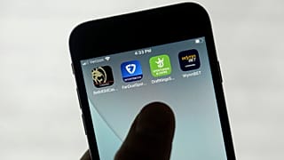 FanDuel, DraftKings, and other online gambling apps are displayed on a phone on Sept. 26, 2022. 