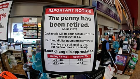 FILE - A sign in a Kwik Trip store shows the store will no longer be using pennies to give change, Oct. 23, 2025, in Yorkville, Wis.