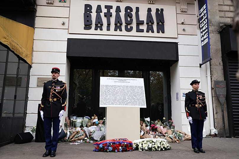 Republican Guards stand guard outside the Bataclan concert hall, Thursday Nov. 13, 2025 in Paris as part of ceremonies marking the 10th anniversary of terrorist attacks.