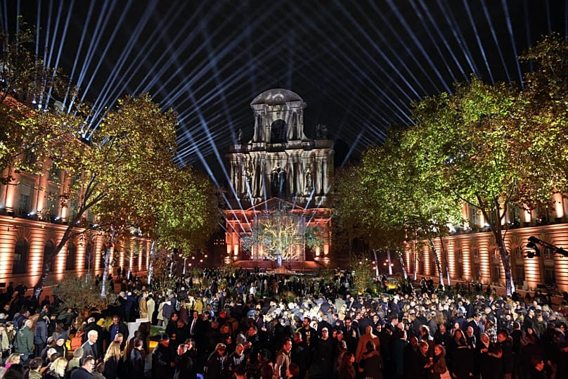 People attend the inauguration of the "Jardin du 13 novembre 2015", Thursday Nov. 13, 2025 in Paris.