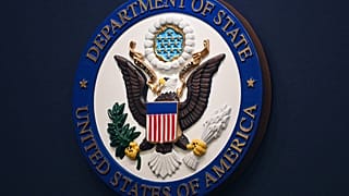 FILE: The US State Department seal is seen on the briefing room lectern at the State Department HQ in Washington, 31 January 2022