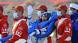 Astronaut Chen Zhongrui is carried out from the Shenzhou-21 spaceship's return capsule in northern China's Inner Mongolia Autonomous Region, 14 November, 2025