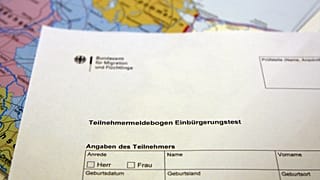 FILE ´- This photo shows a sign-up form for the German naturalization test in Berlin, Monday, Sept. 1, 2008.