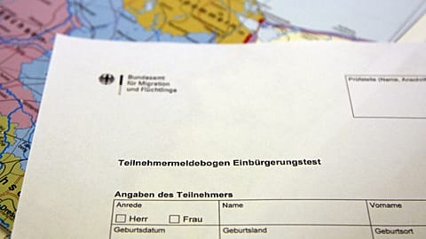FILE ´- This photo shows a sign-up form for the German naturalization test in Berlin, Monday, Sept. 1, 2008.