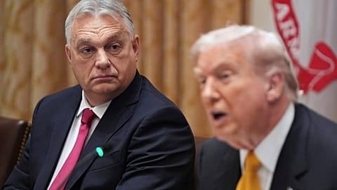 Hungary's Prime Minister Viktor Orban listens as President Donald Trump speaks with reporters during a meeting in the Cabinet Room of the White House, Friday, Nov. 7, 2025, in