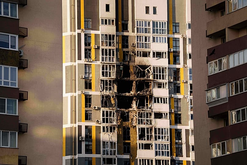 A residential building shows damage after a Russian attack on Kyiv, 14 November, 2025