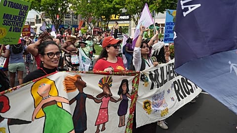 Activists participate in a climate protest during the COP30 UN Climate Summit, Saturday, Nov. 15, 2025, in Belem, Brazil. (AP Photo/Joshua A. Bickel)