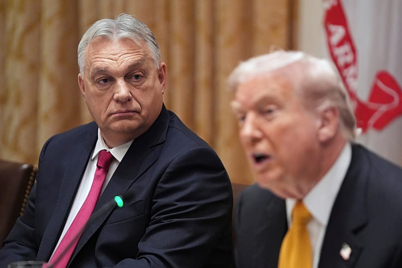 Hungary's Prime Minister Viktor Orban listens as President Donald Trump speaks with reporters during a meeting in the Cabinet Room of the White House, Friday, Nov. 7, 2025