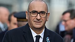 Le ministre français de l'Intérieur, Laurent Nuñez, lors de l'hommage aux victimes des attentats de 2015 devant le Stade de France à Saint-Denis, le 13 novembre 2025. 