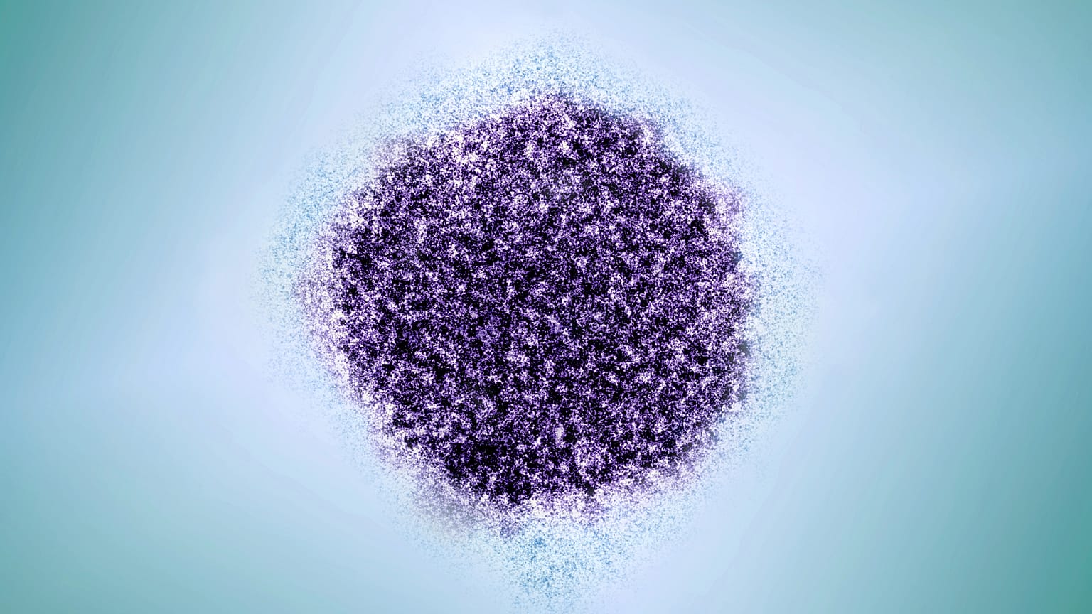 Esta micrografía electrónica coloreada, facilitada por la Universidad Rockefeller y el NIAID, muestra un virión de la hepatitis C. 