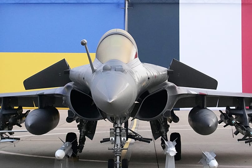 A Rafale jet fighter is seen before the arrival of Ukrainian President Volodymyr Zelenskyy  at the Villacoublay air base near Paris, 17 November 2025
