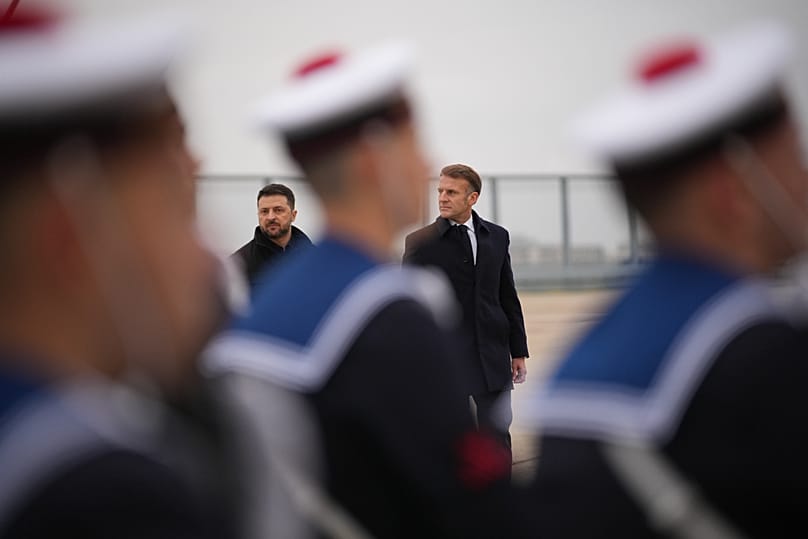 French President Emmanuel Macron and Ukrainian President Volodymyr Zelenskyy review the troops at the Villacoublay air base near Paris, 17 November 2025