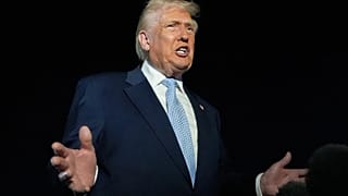 President Donald Trump speaks to reporters before boarding Air Force One at Palm Beach International Airport on his way back to the White House. 16 November 2025