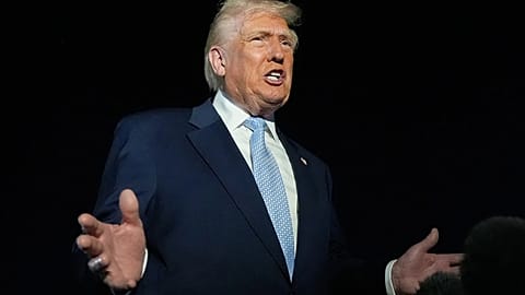 President Donald Trump speaks to reporters before boarding Air Force One at Palm Beach International Airport on his way back to the White House. 16 November 2025