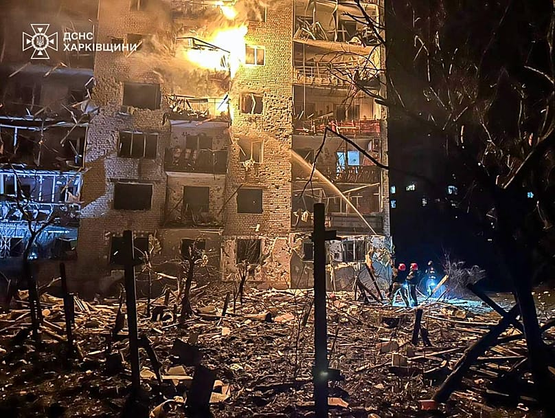 Emergency services personnel work to extinguish a fire following a Russian attack in Balakliya, 17 November, 2025