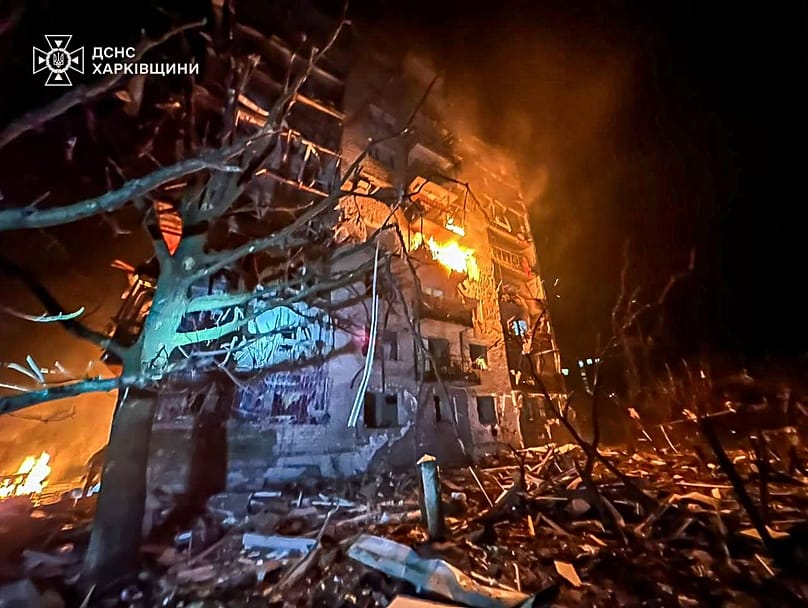 Emergency services personnel work to extinguish a fire following a Russian attack in Balakliya, 17 November, 2025