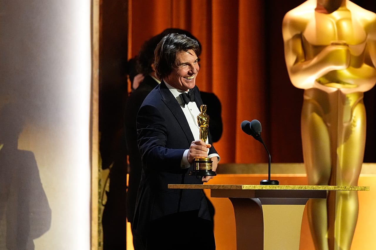 Tom Cruise accepting his Oscar