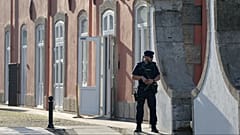 FILE: A Portuguese police officer stands outside a hotel in Porto, 6 October 2023