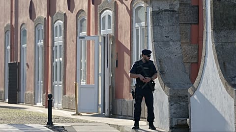 FILE: A Portuguese police officer stands outside a hotel in Porto, 6 October 2023