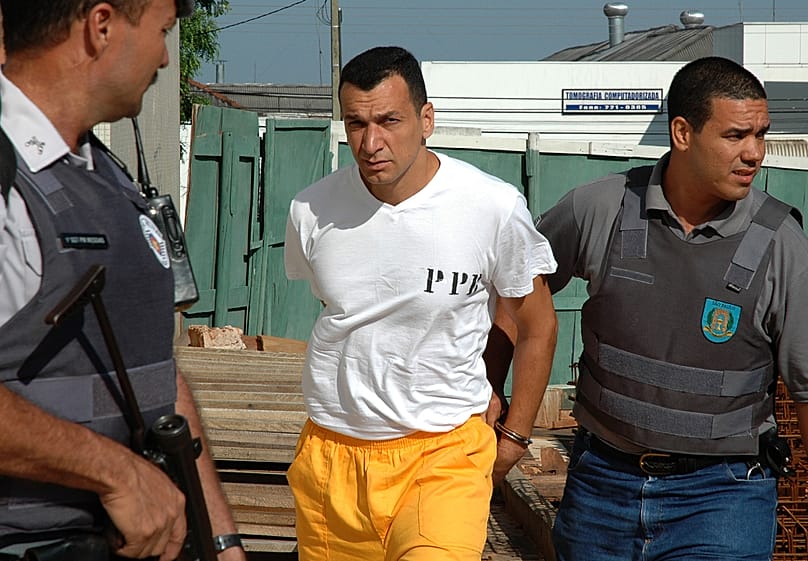 FILE: Marcos Willians Herbas Camacho, aka Marcola, is escorted by police in Sao Paulo, Brazil, 7 November 2005