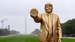 FILE. A statue of President Donald Trump holding a bitcoin in recognition of his support for cryptocurrency on the National Mall in Washington. Sept. 2025
