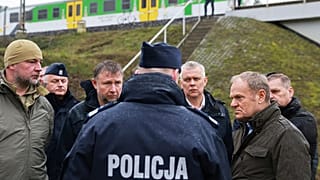 Poland’s Prime Minister Donald Tusk visits the site of a rail line that was damaged by sabotage near Dęblin, 17 November, 2025