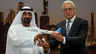 Airbus' CEO of commercial aircraft Christian Scherer and Sheikh Ahmed bin Saeed Al Maktoum, the CEO of Emirates and chairman of FlyDubai, at the Dubai Air Show. 18 Nov. 2025.