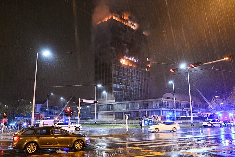 Firefighters extinguish a fire at the 'Vjesnik' skyscraper in Zagreb, 18 November, 2025