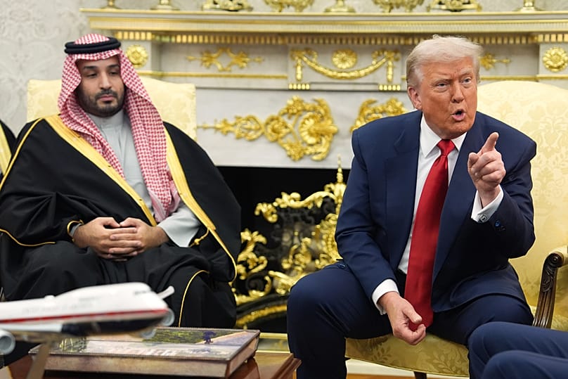 Trump points to a reporter as he meets Saudi Arabia's Crown Prince Mohammed bin Salman in the Oval Office of the White House - Tuesday 18 November 2025