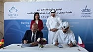 Officials attend the MoU signing in Doha.