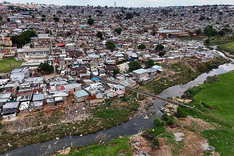 An aerial view of the Jukskei River in the Alexandra township in Johannesburg, 12 November, 2025