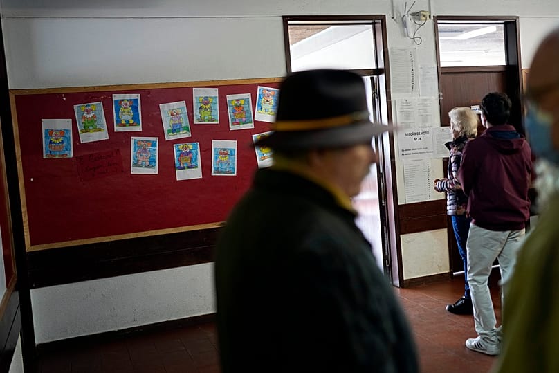 Children's drawings at a school turned polling station, in Lisbon, Sunday, March 10, 2024.