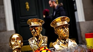 FILE: Sculptures showing Francisco Franco are on sale during a gathering to remember the former Spanish dictator on the anniversary of his death, in Madrid, 23 November 2014