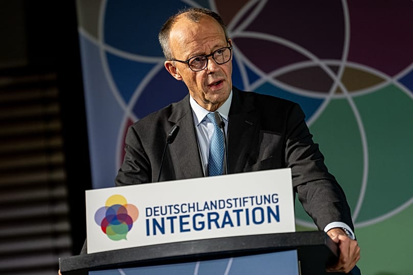 German Chancellor Friedrich Merz delivers a speech at the award ceremony for the TALISMAN Prize for Social Cohesion in Berlin, 19 November, 2025