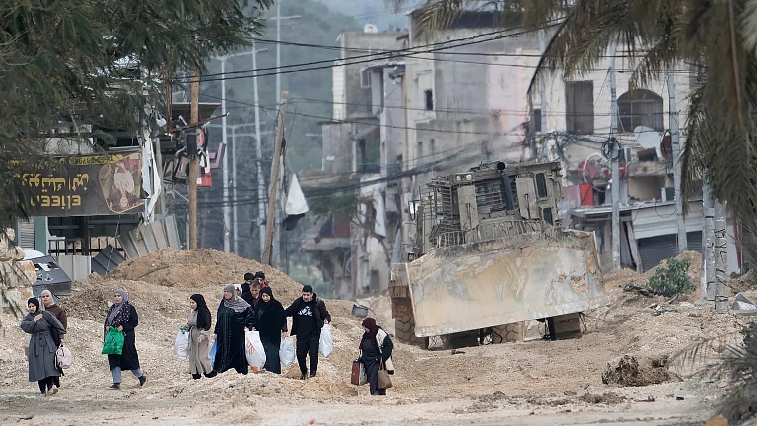 Residents of the West Bank refugee camp of Nur Shams, near Tulkarem