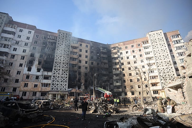 Rescue workers put out a fire of a residential building which was heavily damaged by a Russian strike on Ternopil, 19 November, 2025