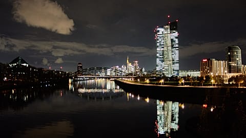 The European Central Bank is reflected in the river Main in Frankfurt, Germany. 20 Nov. 2025.