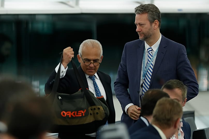 Nathan Gill, right, of the Brexit party arrives at the European Parliament in Strasbourg, 14 January, 2020 